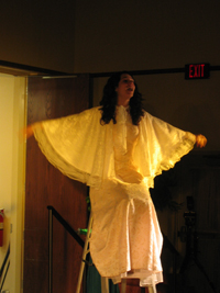 An angel on a ladder singing